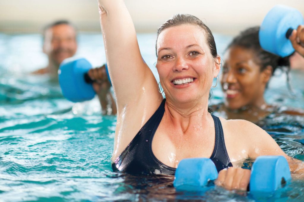 woman doing water aerobics