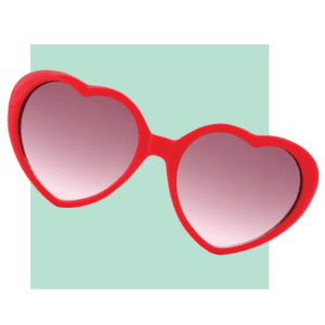 red heart shaped sunglasses on light green background chattanooga