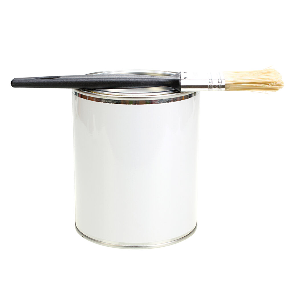 paint brush on top of paint bucket