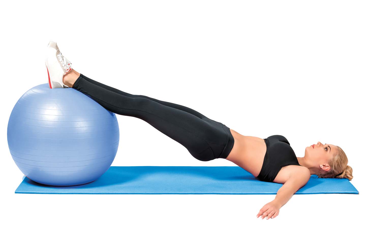 woman stretching using an exercise ball chattanooga