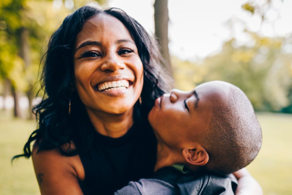 happy smiling mother hugging her son in chattanooga