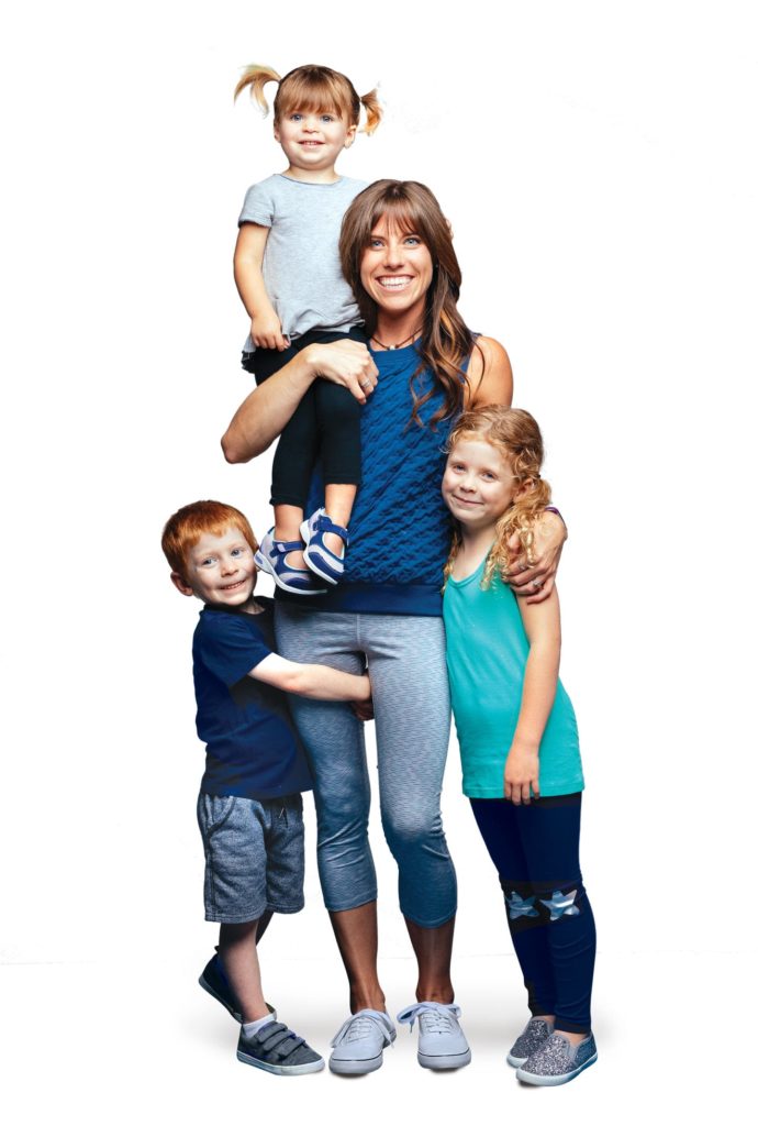 Katie Honeycutt and kids with daughter on her shoulder in chattanooga fit healthy woman