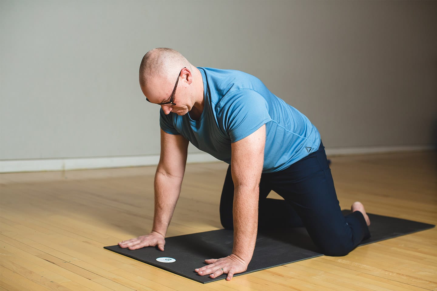 Jonathan ellis chattanooga yoga teacher preparing for child's pose