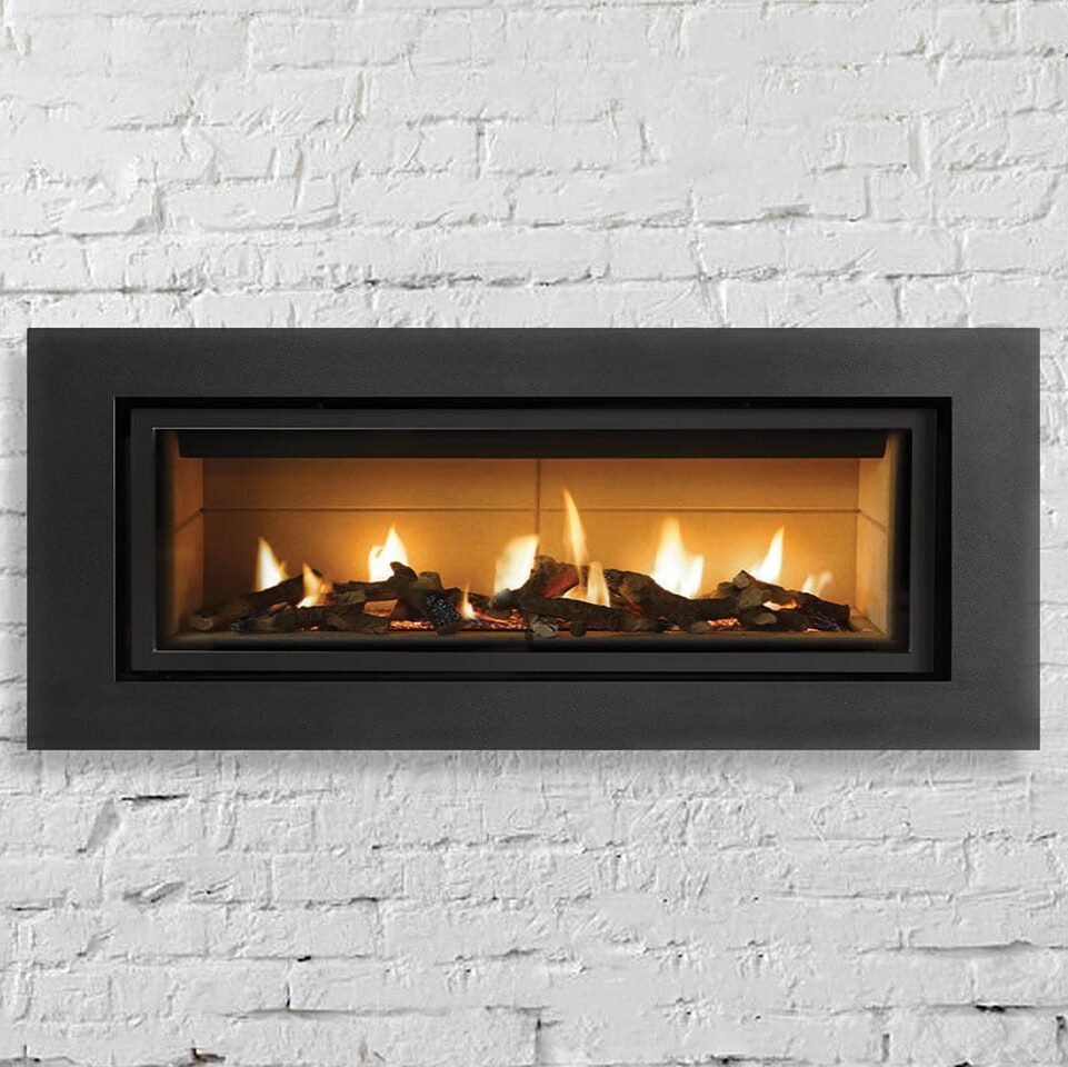 inset fireplace on white brick wall
