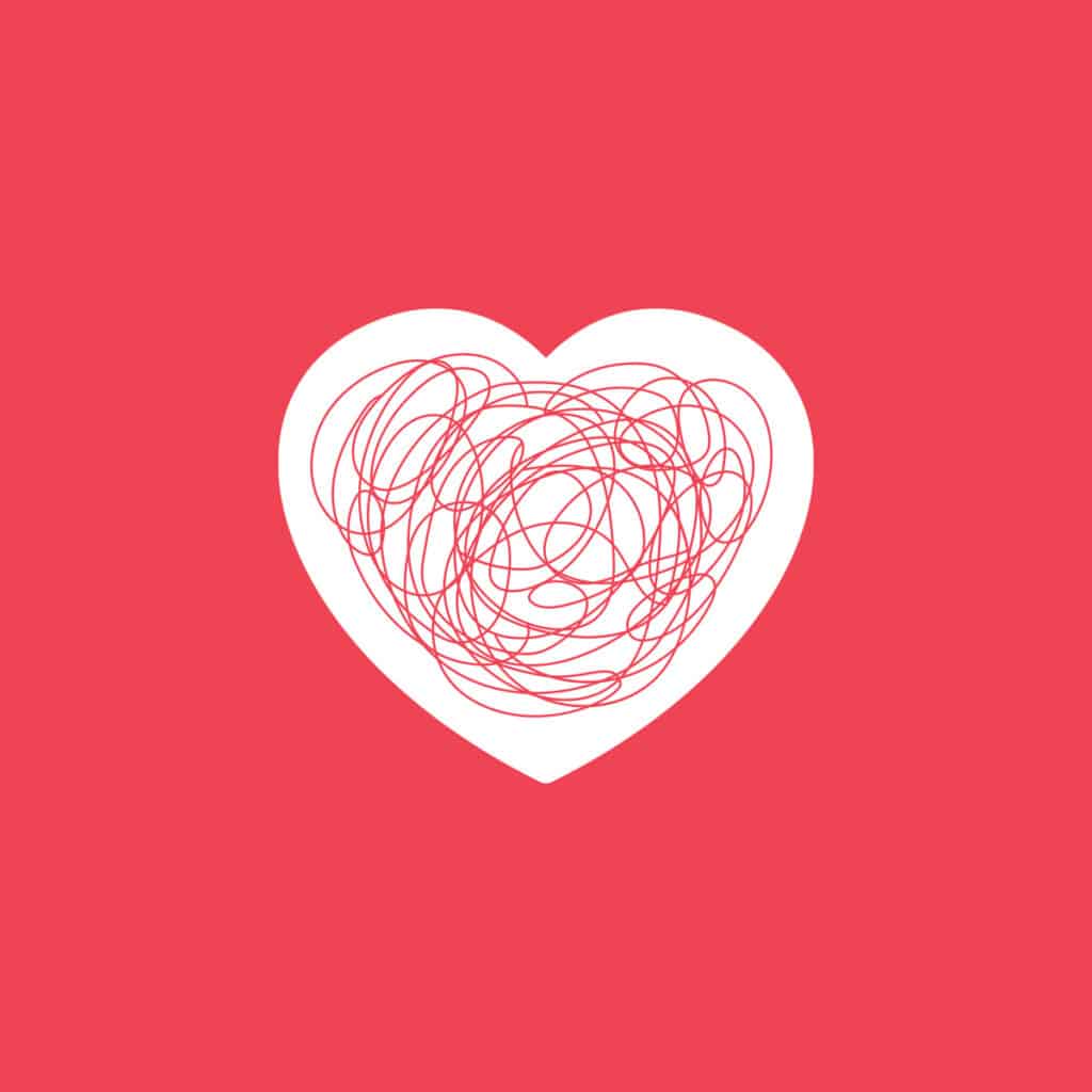 red heart full of scribbles with red background