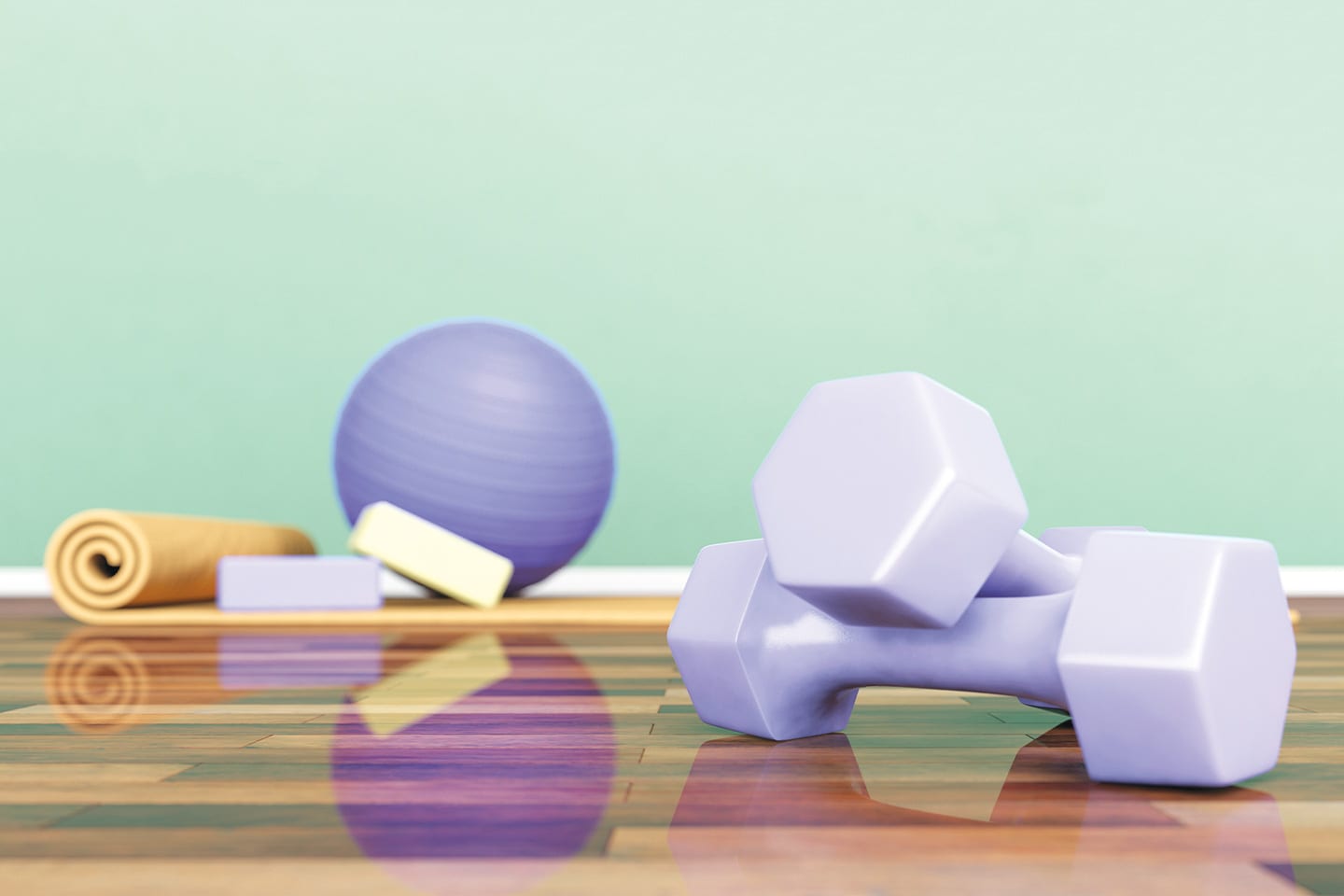 purple yoga mat, exercise ball, and hand weights on wood floor with green wall