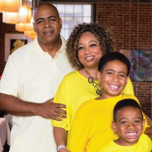 Dr. Marsha Drake with her husband and sons
