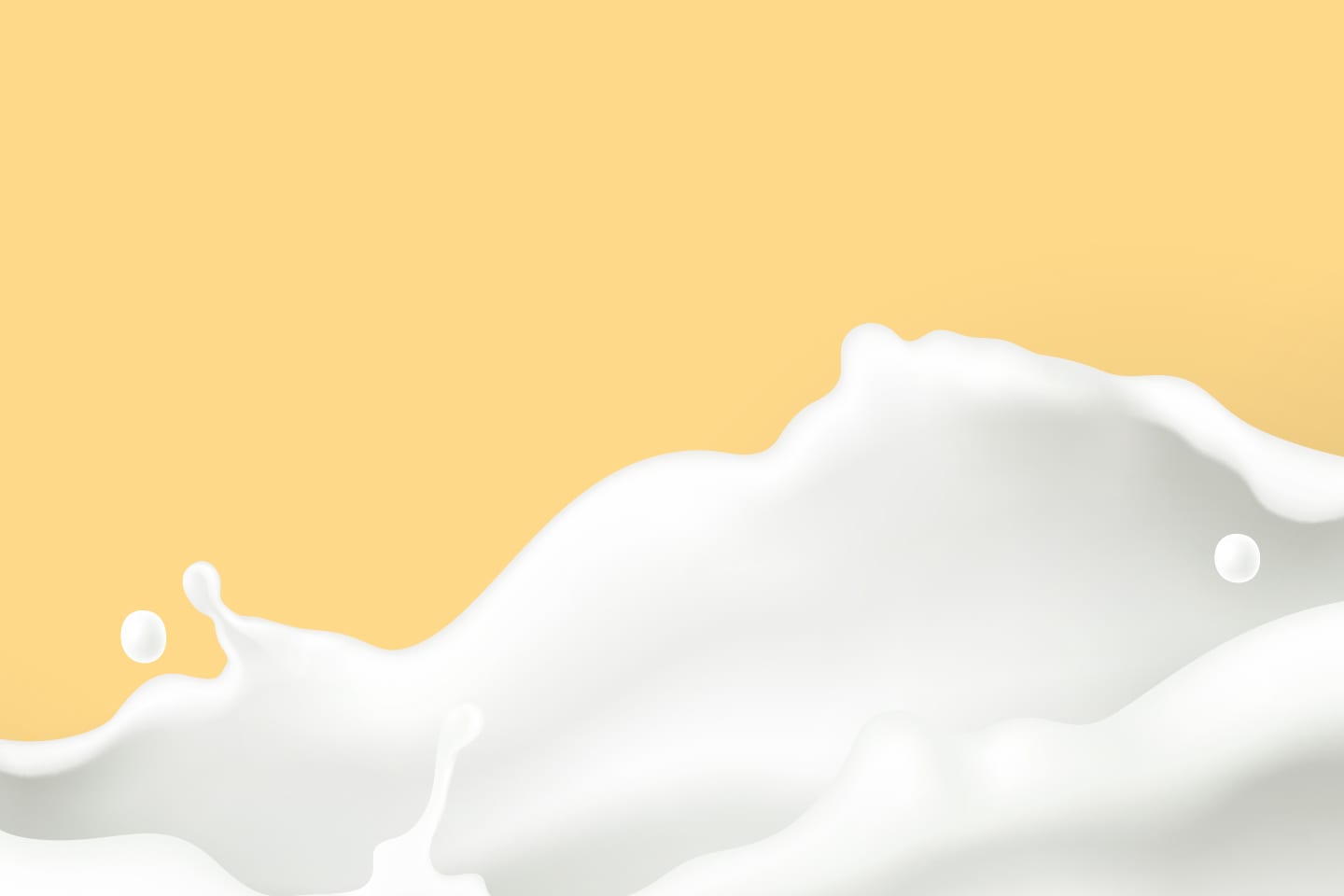 splash of milk on yellow background