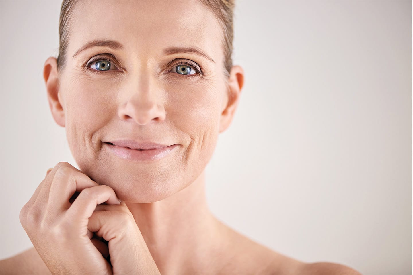 mature woman with full healthy skin who got dermal fillers
