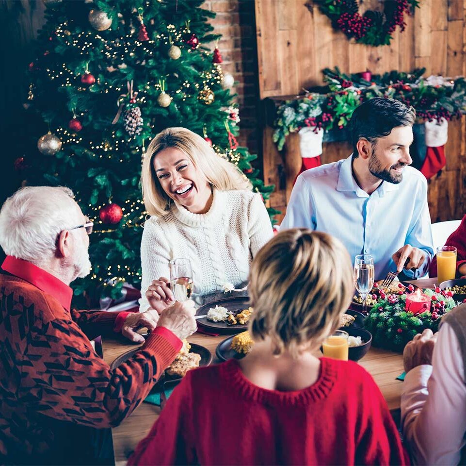 family eating Christmas dinner together
