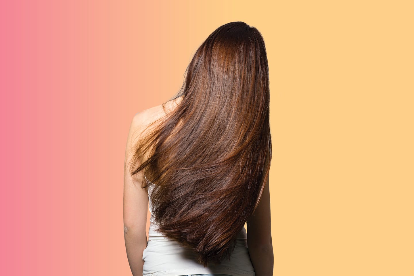 woman shown from behind with long silky hair