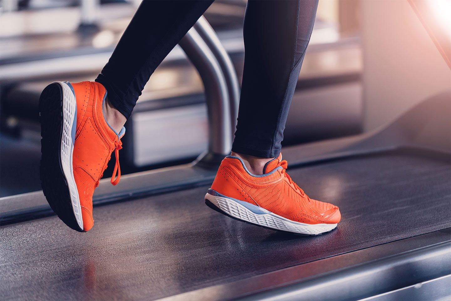woman's feet running on the treadmill