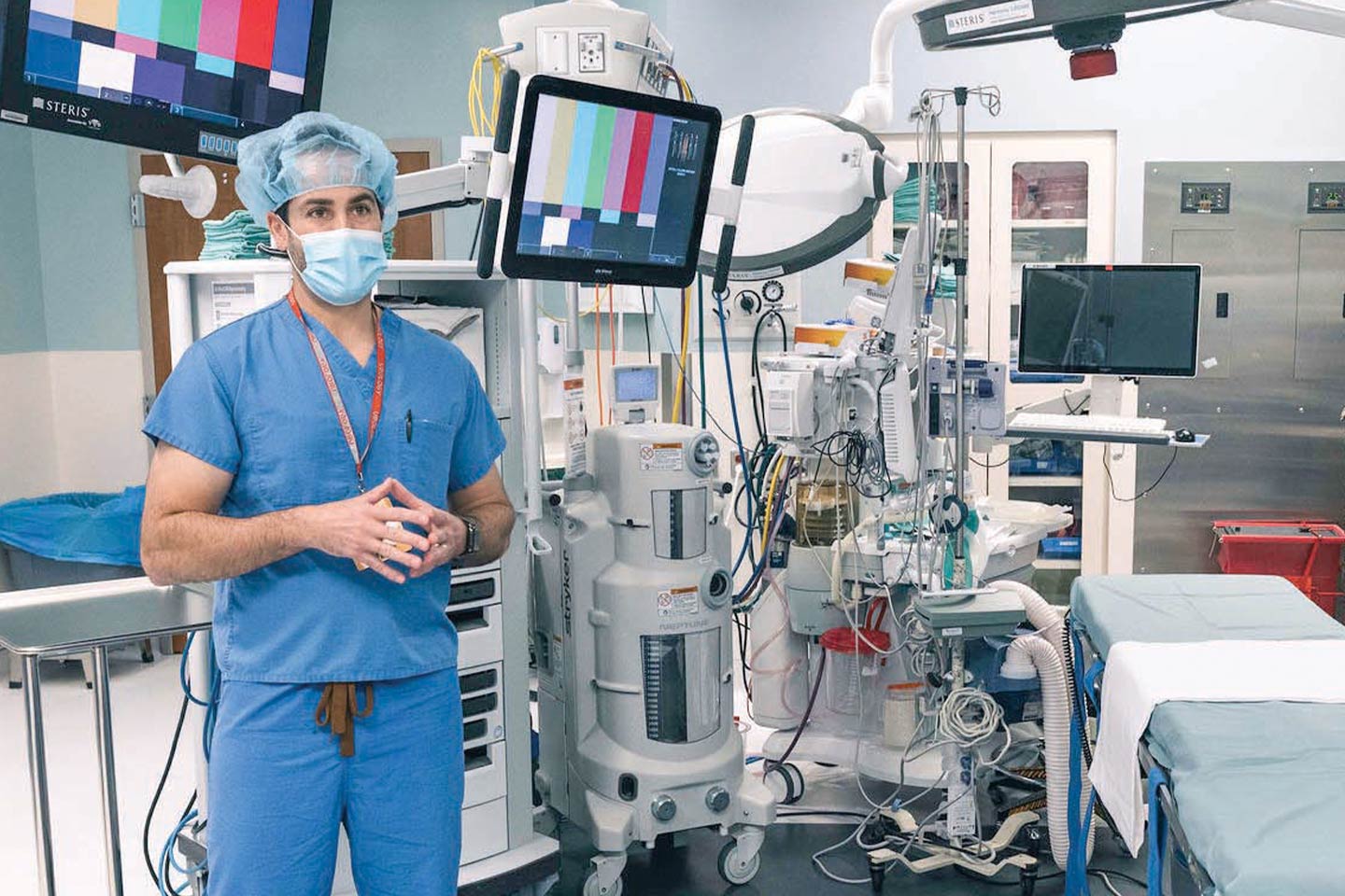 doctor wearing scrubs standing in the operating room