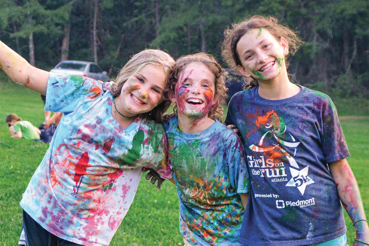 happy girls covered in paint at Camp Juliette Low