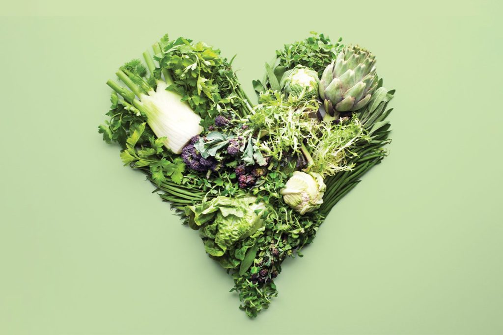 heart made out of green veggie scraps