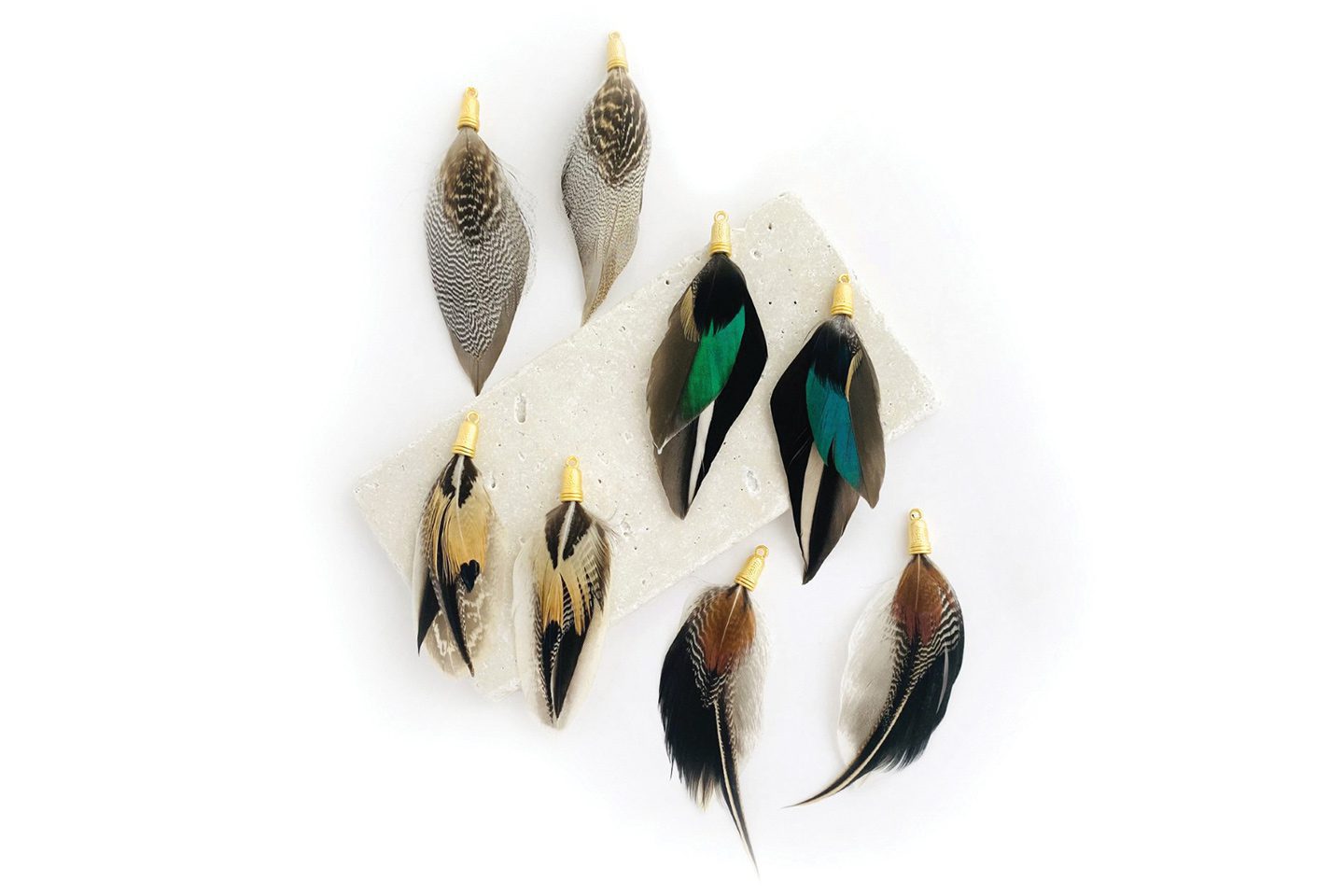 Feather earrings from yacoubian tailors