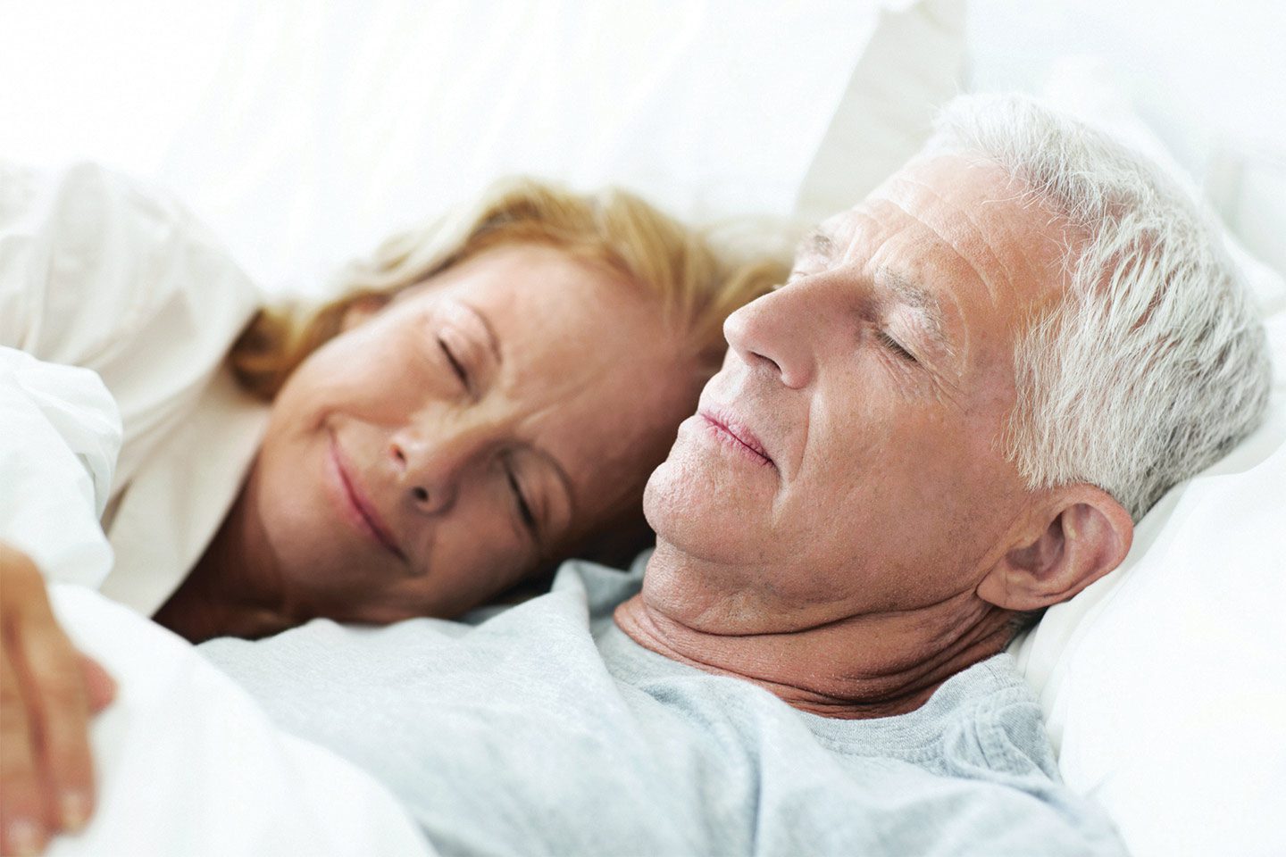 Older couple sleeping