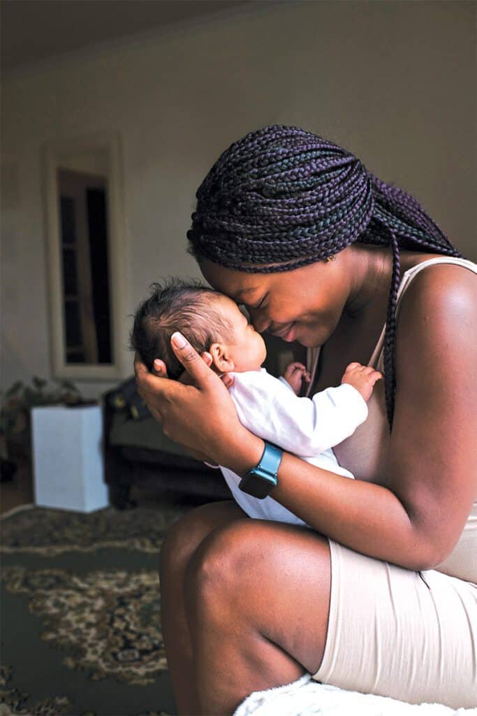 mother holding her baby