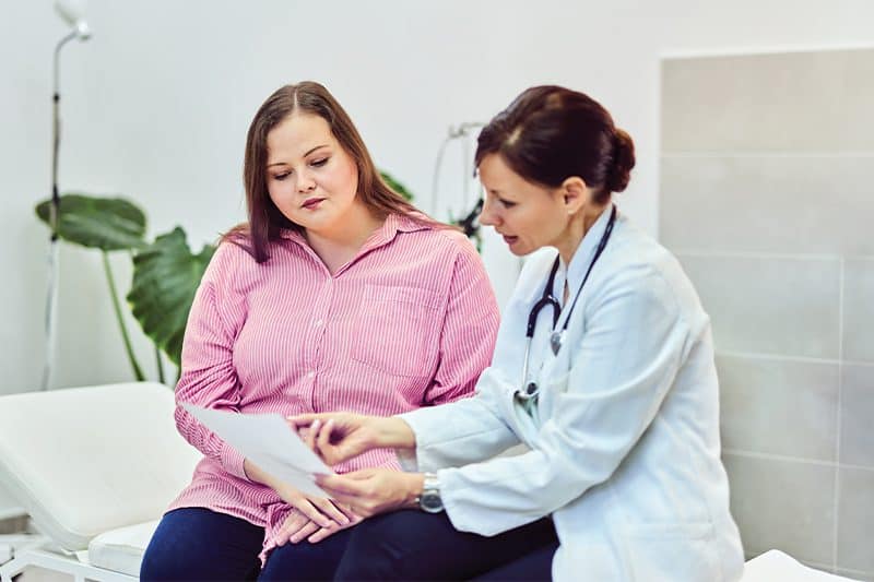 doctor discussing with her patient pcos