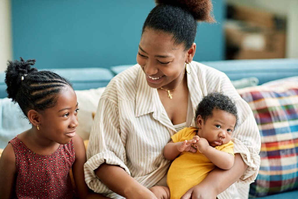 woman with multiple children