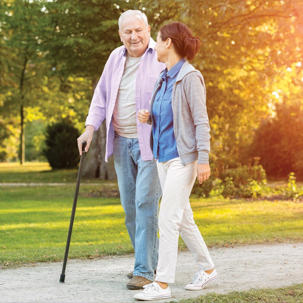 old man and woman walking