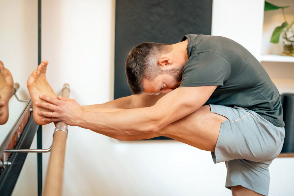 man doing stretches before exercising