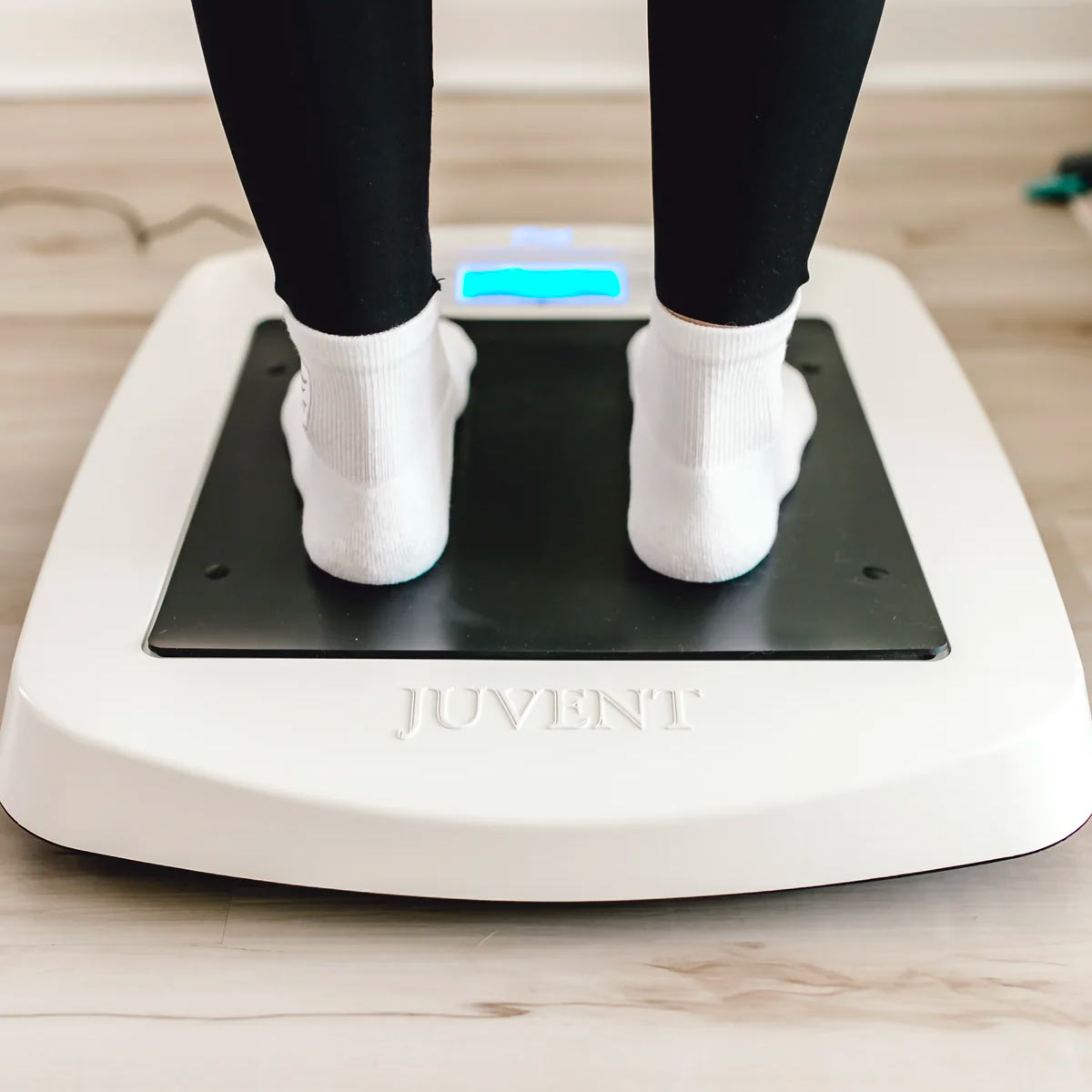 Person standing on Juvent Mico-Impact Platform