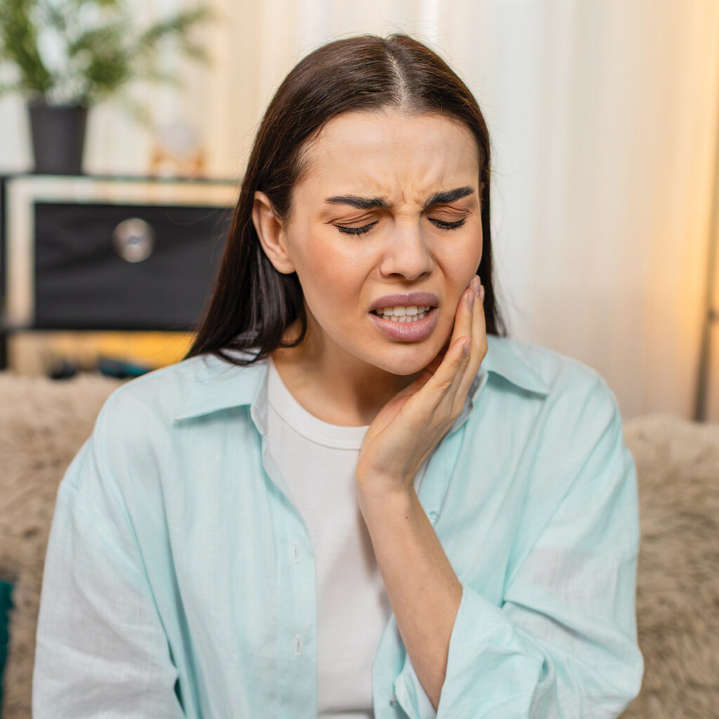 woman with root canal pain
