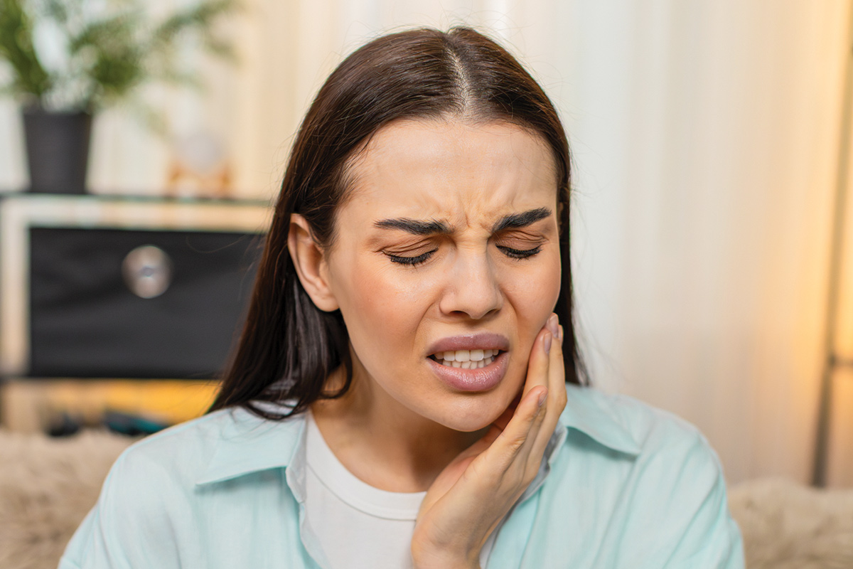 woman with tooth pain