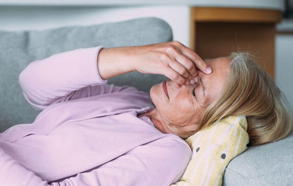 woman with sharp head pain